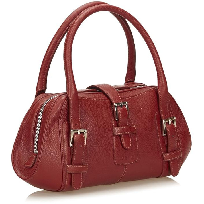 Carolina Herrera Scala Insignia Clutch - Queen Letizia Handbags - Queen  Letizia Style